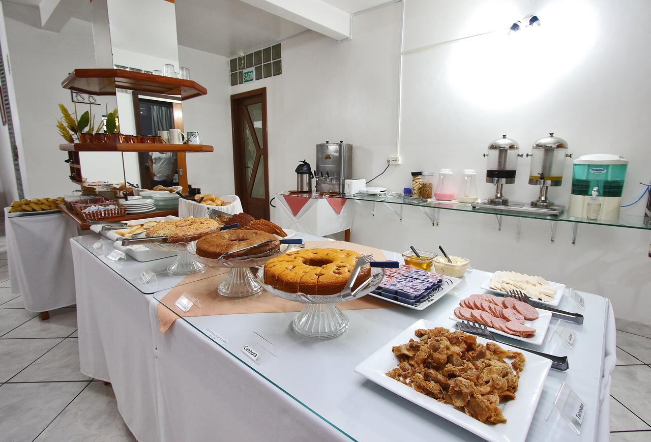 Hotel Vinte Sapiranga Bagian luar foto